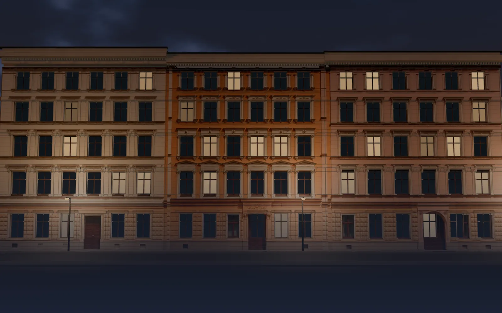 Luckauer Straße 12–14 at dusk: the facade of three Gründerzeit houses, light in only a few windows